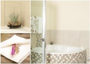 a bathroom with a bath tub and a sink at Pumbaa Wildlife Park & Accommodation in Nelspruit