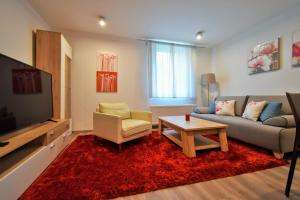 Posezení v ubytování Apartment Dalibor II with private entrance and private garage