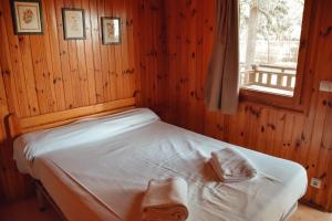 Postel nebo postele na pokoji v ubytování Camping La Aldea