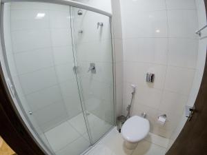 a bathroom with a shower and a toilet at Le Parc Hotel in Caetité