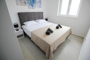 Postel nebo postele na pokoji v ubytování Sunshine Bay