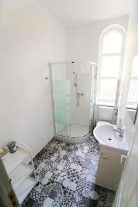 a bathroom with a shower and a sink at Capra Vecinului in Târgu-Mureş +46 photos