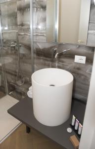 Koupelna v ubytování RICCIONE SUITE DESIGN