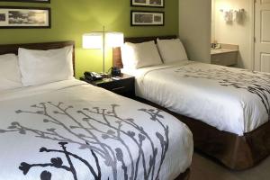 Cama o camas de una habitación en Sleep Inn