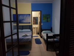 Poschodová posteľ alebo postele v izbe v ubytovaní Pousada das Artes 1