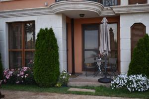 A garden outside Cascadas Ravda - Gorgeous 2 bedrooms family apartment