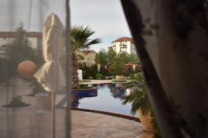 The swimming pool at or close to Cascadas Ravda - Gorgeous 2 bedrooms family apartment