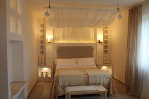 Letto o letti in una camera di Relais in Contrada