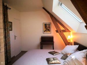 Postelja oz. postelje v sobi nastanitve Gîte Saint-Bauld, 4 pièces, 6 personnes - FR-1-381-505