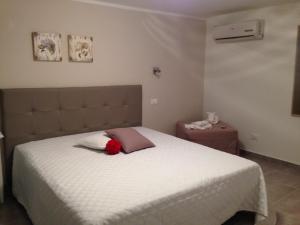 Postel nebo postele na pokoji v ubytování Appartamento Galante