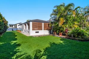 an image of a house with a yard at A Wave From It All - Lennox Head in Lennox Head