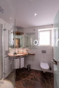 Ванна кімната в Hotel An der Eiche