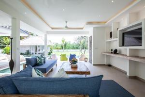 Et tv og/eller underholdning på Villa Matahari Munggu 5BR