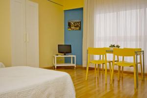 TV a/nebo společenská místnost v ubytování Barcelona City Apartment