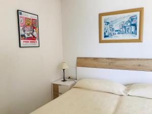 Postel nebo postele na pokoji v ubytování EDIFICIO PEÑON DE IFACH