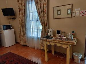 Kuchyň nebo kuchyňský kout v ubytování Avondrust Guest House + 16 fotografií