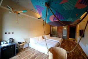 Letto o letti in una camera di Thinker Hotel