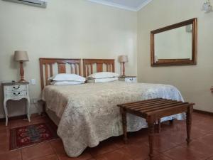 Postel nebo postele na pokoji v ubytování Avondrust Guest House
