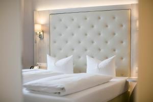 Posteľ alebo postele v izbe v ubytovaní Hotel Sailer