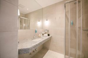 Kúpeľňa v ubytovaní Hotel Sailer