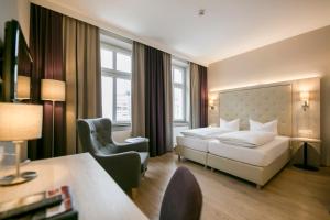 Posteľ alebo postele v izbe v ubytovaní Hotel Sailer