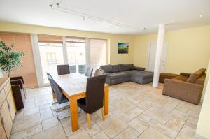 Area soggiorno di Penthouse in the heart of Zell am See