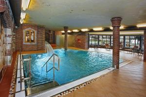 Bazén v ubytování Hotel U Sládka nebo v jeho okolí