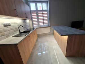 Η κουζίνα ή μικρή κουζίνα στο Ines Apartament +3 φωτογραφίες