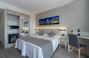 Postel nebo postele na pokoji v ubytování Medplaya Hotel Bali