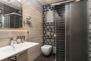 Koupelna v ubytování Boutique Apartments - Sevtopolis