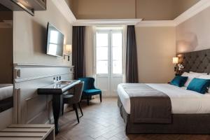 Postel nebo postele na pokoji v ubytování Hotel Pjazza Merkanti - Boutique Living