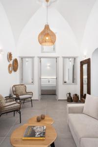 a living room with a couch and a table at Kastro Mansion in Pyrgos