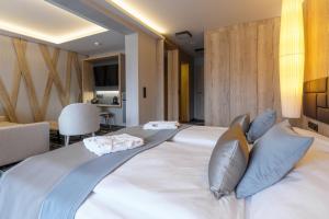 Postel nebo postele na pokoji v ubytování Hotel Hills