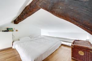 Tempat tidur dalam kamar di Paris 1st - Châtelet Les Halles - Rue Ferronnerie - ID 161