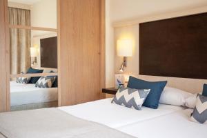 Postel nebo postele na pokoji v ubytování Grupotel Dunamar