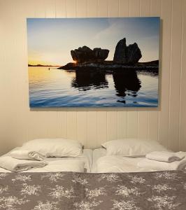 Ένα ή περισσότερα κρεβάτια σε δωμάτιο στο Valldal Fjord Lodge B&B