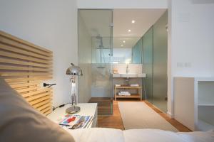 Letto o letti in una camera di Quercus Appartements contactless check-in