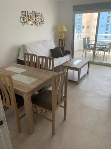 A seating area at SERVICE APART LAZARO - Apartamentos Aguamarina 47