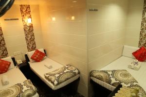 Ένα ή περισσότερα κρεβάτια σε δωμάτιο στο Russian Hostel