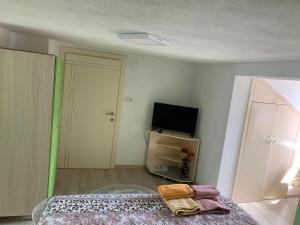 TV a/nebo společenská místnost v ubytování Syzo Rooftop 360° + 12 fotografií