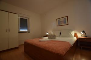 Postel nebo postele na pokoji v ubytování Apartment Lana 5 pers