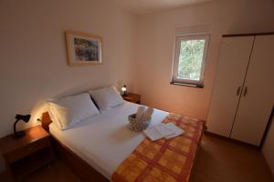 Postel nebo postele na pokoji v ubytování Apartment Lana 5 pers