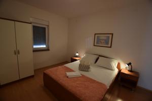 Postel nebo postele na pokoji v ubytování Apartment Lana 5 pers