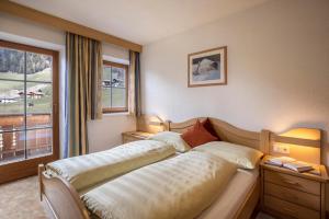 Ένα ή περισσότερα κρεβάτια σε δωμάτιο στο Apartment Edelweiß Oberachrain