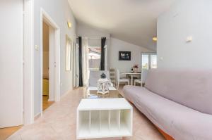 Posezení v ubytování Apartments Manda