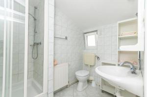 Koupelna v ubytování Apartments Manda