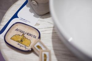 Certifikát, ocenenie alebo iný dokument vystavený v ubytovaní Acqua di Civita Beauty & Rooms