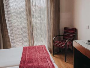 Postel nebo postele na pokoji v ubytování Hotel Coroa de Fátima