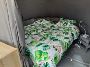Säng eller sängar i ett rum på Ecochique