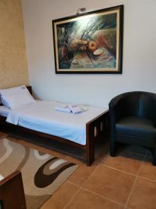 Krevet ili kreveti u jedinici u okviru objekta JOKSIM Rooms&Restaurant